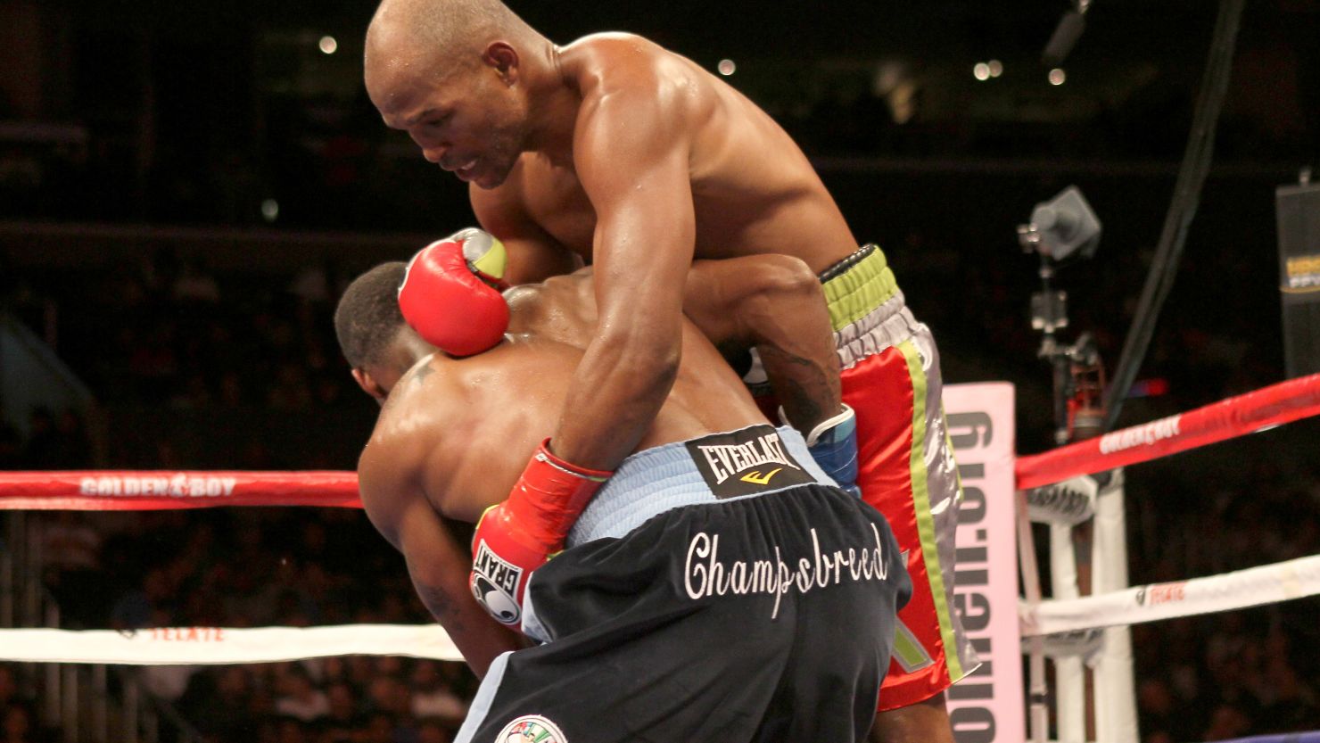 Bernard Hopkins (right) tangles with Chad Dawson during their light heavyweight title fight on October 15.