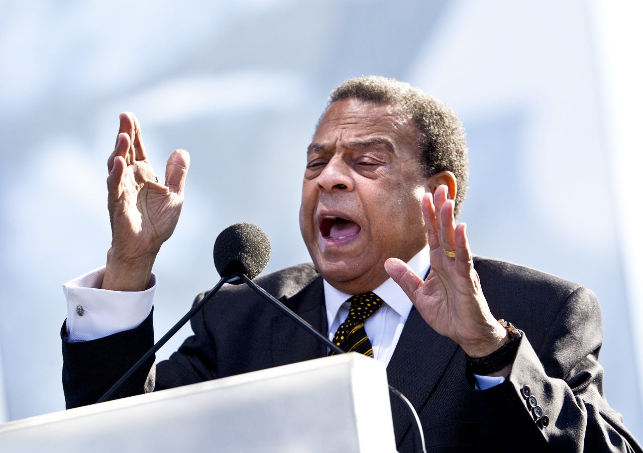 Former U.N. ambassador, former Atlanta mayor and civil rights leader Andrew Young speaks during the dedication.  Young said King was sensitive about his small stature, as he stood only 5 feet 7 inches. "Now he's 30 feet tall, looking down on everybody," Young said.