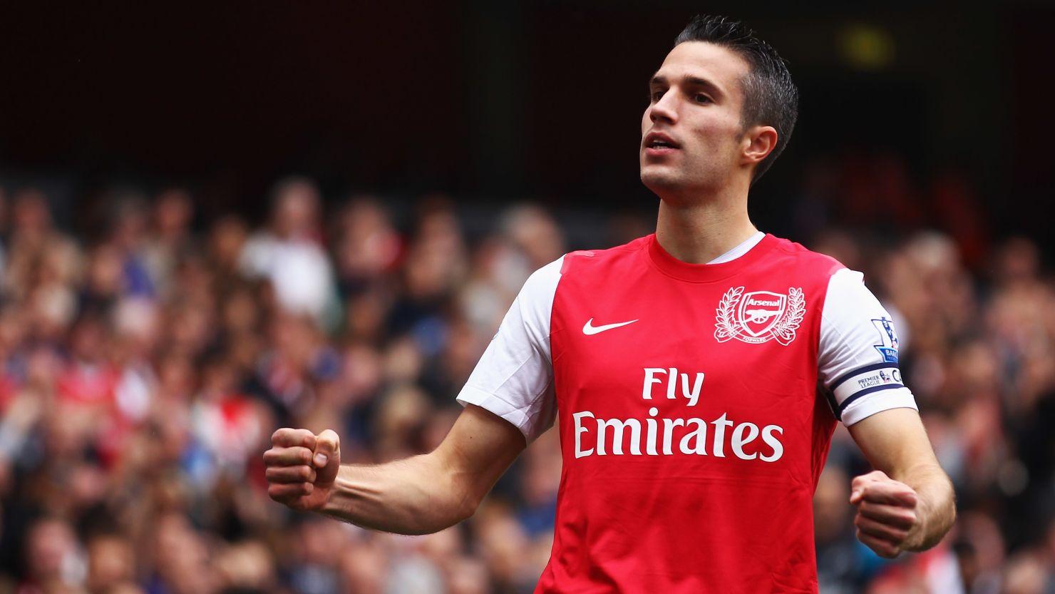 Robin Van Persie celebrates his opening goal for Arsenal at the Emirates in the 2-1 win over Sunderland.