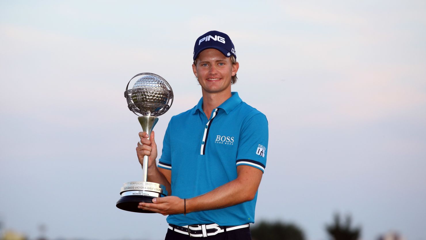 Tom Lewis proudly displays his Portugal Masters crown after victory at Vilamoura