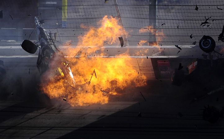 Racing vet Dan Wheldon's car bursts into flames in a multi-car wreck during the Las Vegas Indy 300 on Sunday, October 16. Wheldon, 33, was killed.