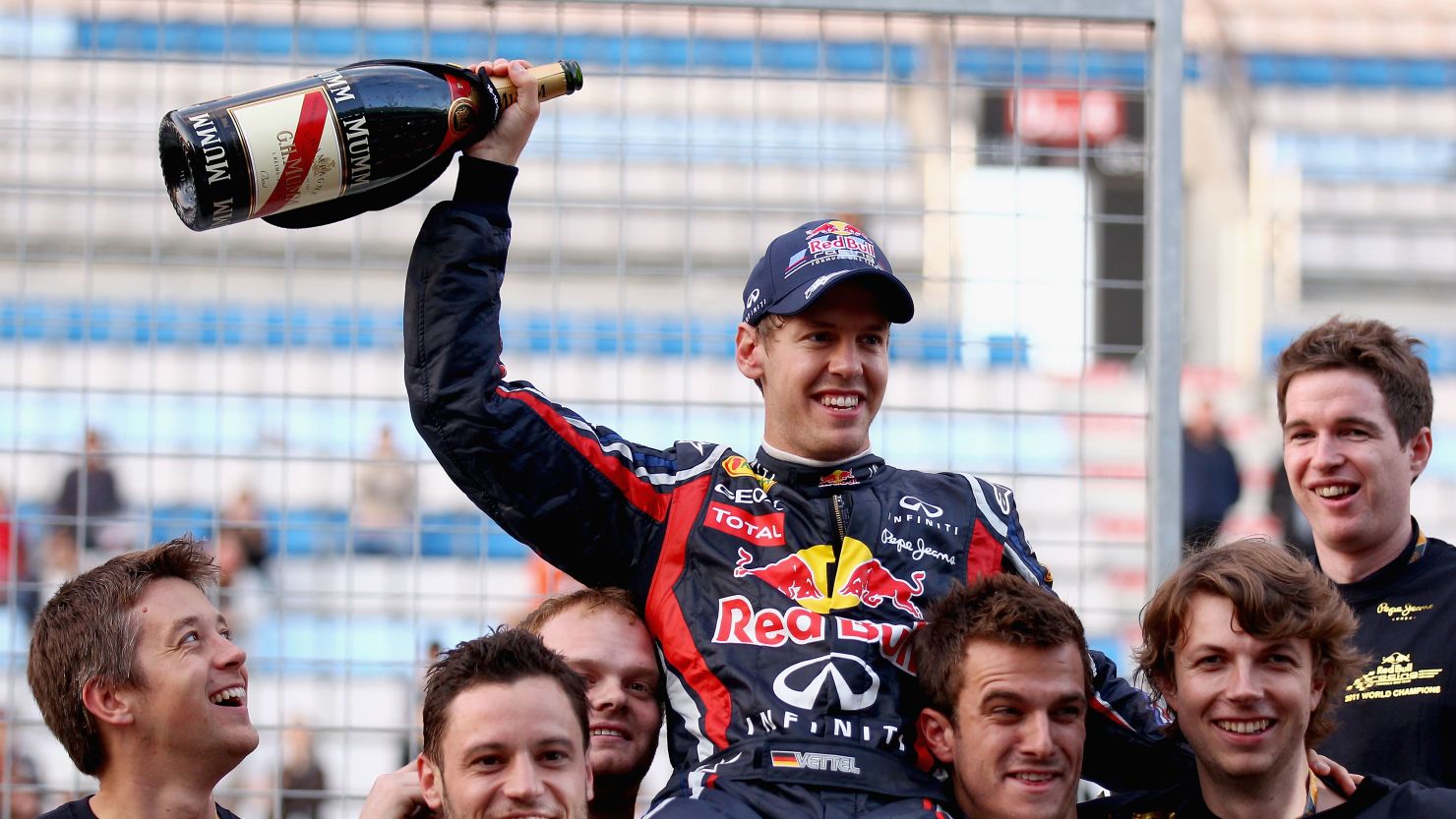 Sebastian Vettel and the Red Bull team celebrate winning the constructors' title