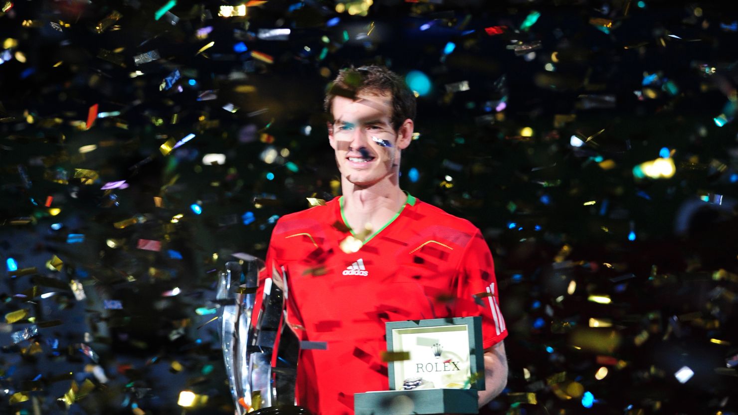 Andy Murray enjoys the spoils of victory as he claims the Shanghai Masters crown 