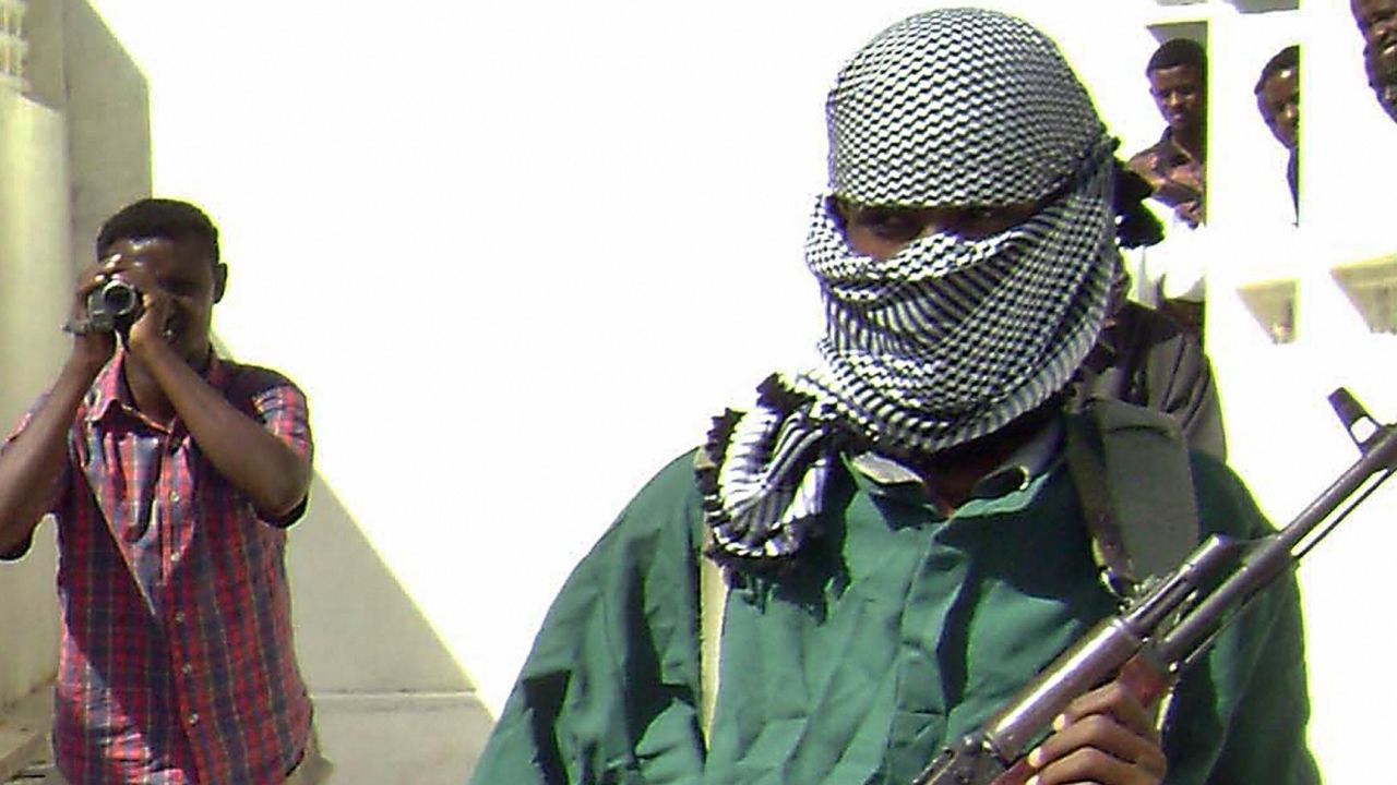 A masked member of the Al Shabaab militia, pictured in a photograph dated December 14, 2008.