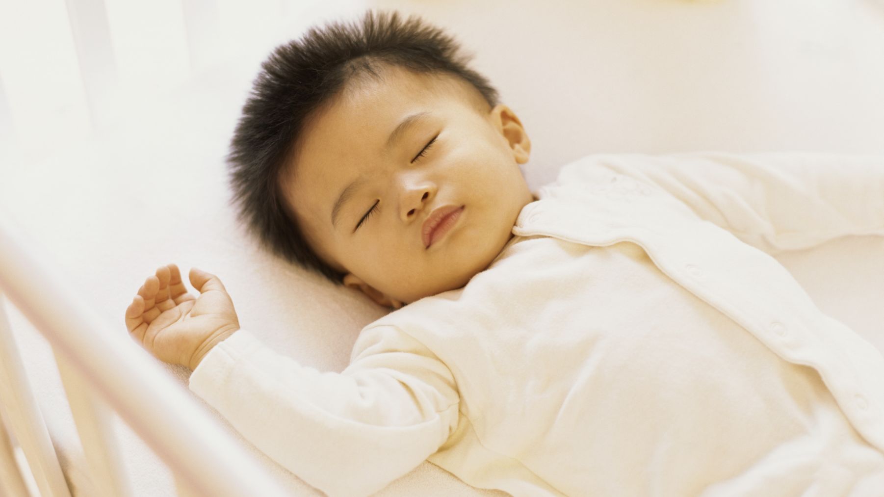 The AAP now recommends that infants sleep on their backs on a firm mattress, without any soft objects or loose bedding.