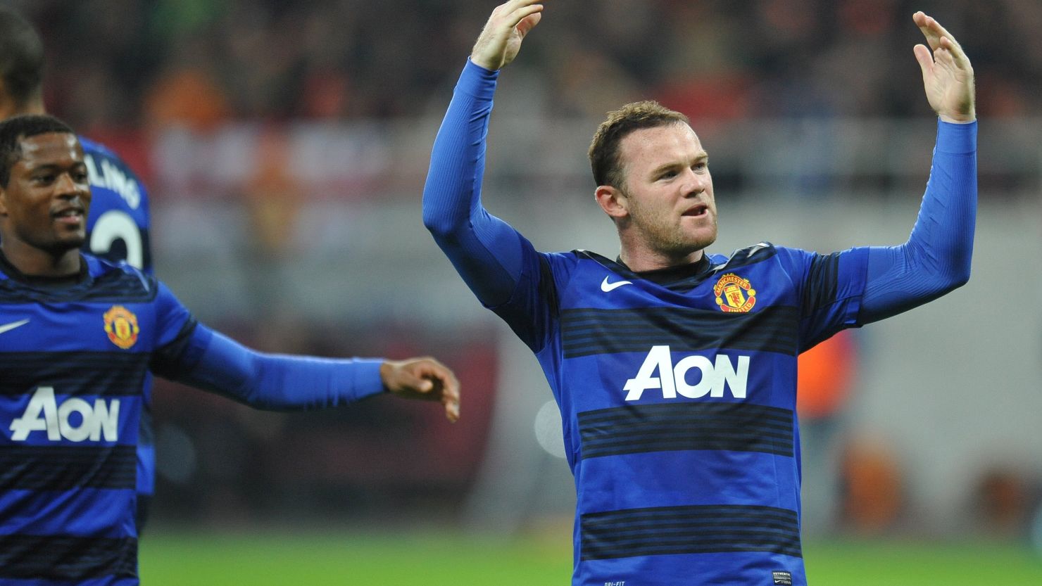Wayne Rooney scored two penalties to secure Manchester United's first win in the UEFA Champions League this season
