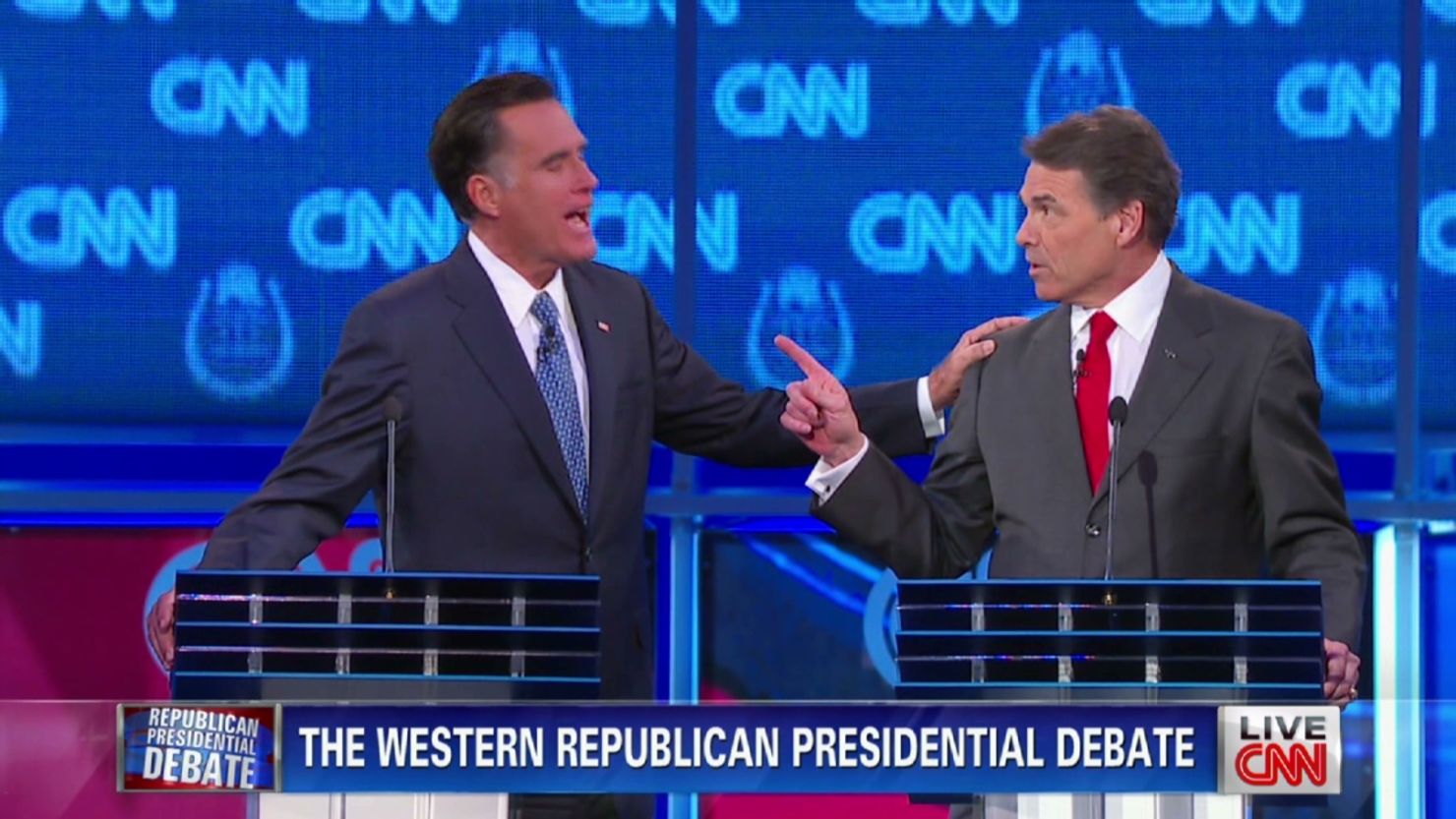 Mitt Romney, left, and Rick Perry argue in the CNN/Western Republican debate on Tuesday.