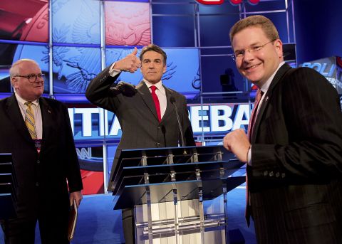 Perry gives the thumbs up at rehearsal.  The bad blood between Romney and Perry boiled over in the debate's first hour as the two GOP heavyweights traded harsh accusations and showed flashes of anger.