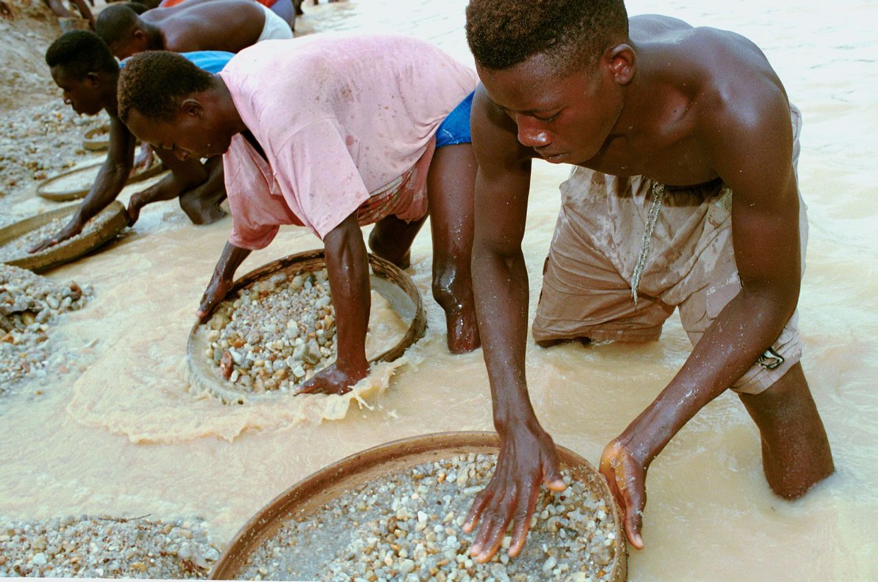 Workers pan for diamonds in a mine near Kenema, Sierra Leone, in June 2001. Diamonds were the main issue in the country's decade-long tumultuous civil war.