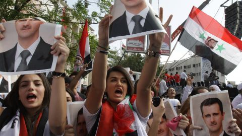   Supporters of Syrian President Bashar al-Assad stage a pro-regime rally in Damascus earlier this month.