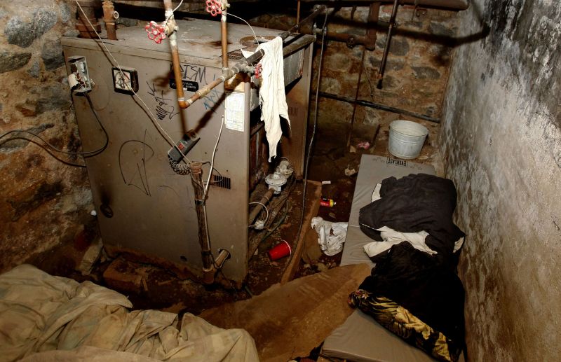 Woman held captive in Philadelphia basement for a decade sues city