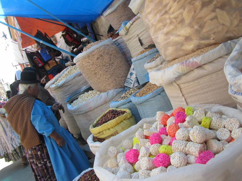A variety of puffed corn, nuts and seeds are available from street vendors throughout La Paz, Bolivia. The city is often the point of entry for travelers visiting Bolivia for its natural wonders.