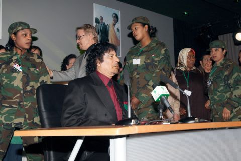 At a 2007 meeting in Paris, Gadhafi is seen surrounded by his female bodyguards.