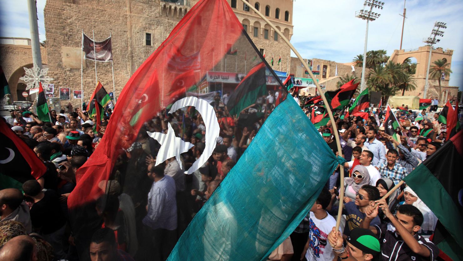 Libyans celebrate in the streets of Tripoli on Thursday. Isobel Coleman says it is unclear who will lead the country.