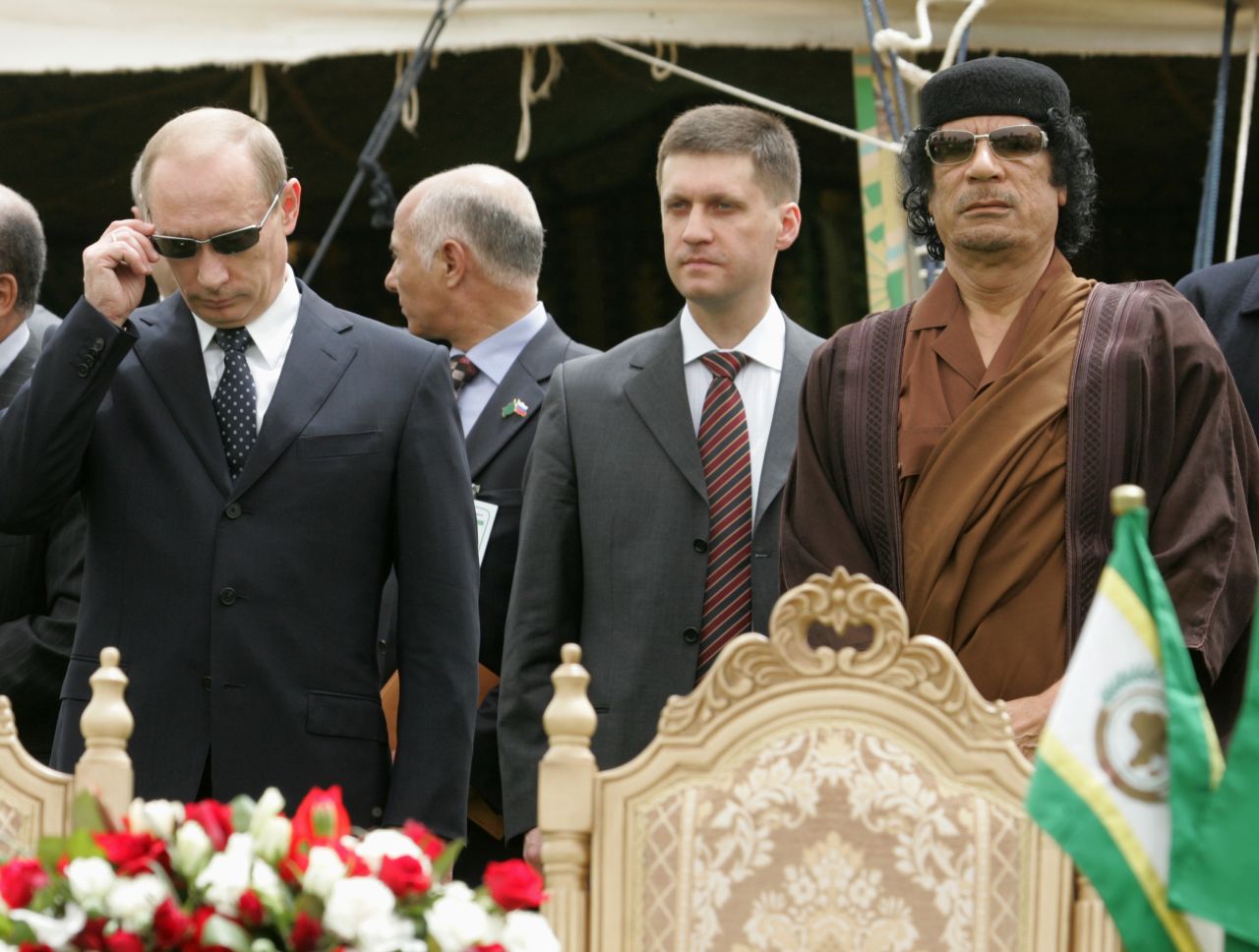 Russian President Vladimir Putin and Gadhafi sign an agreement between Russia and Libya on April 17, 2008, in Tripoli.