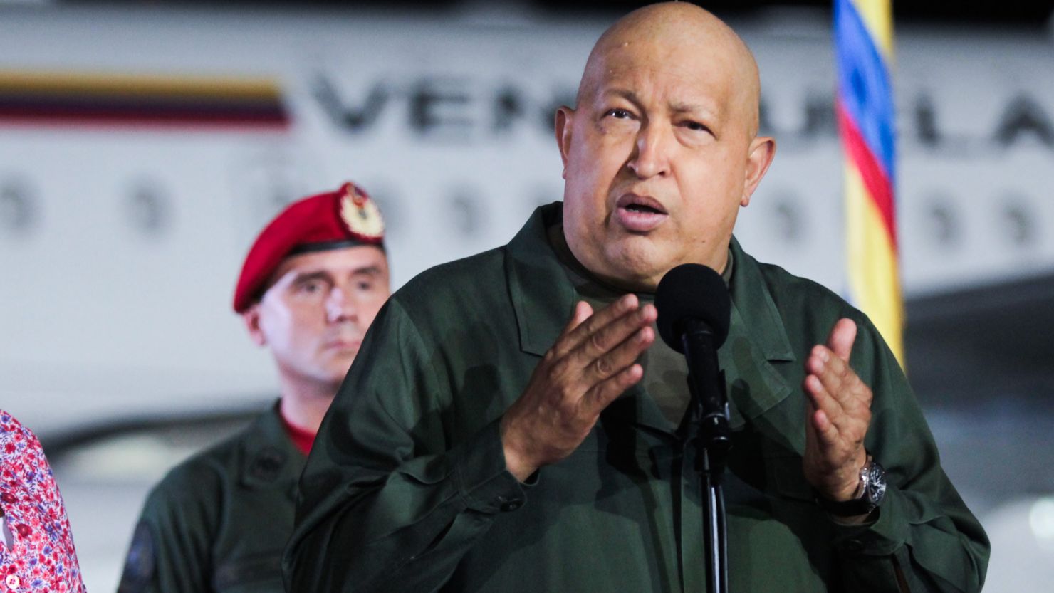 In a government photo, Hugo Chavez speaks next to daughter Rosa Virginia before taking a plane to Cuba on Sunday.