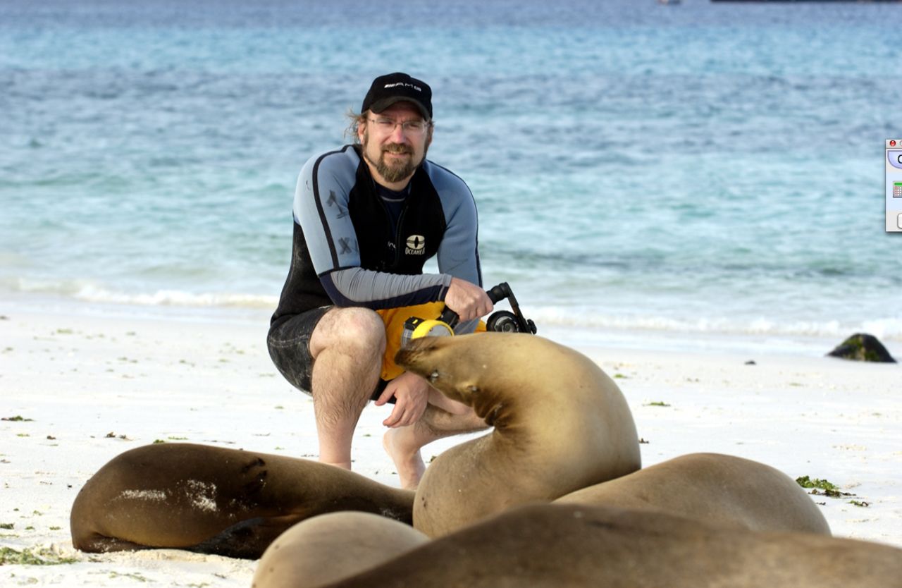 He was lucky to get this shot taken with a sea lion. "I just came out of the water after doing some snorkeling and underwater photography, and found a few new friends sitting near my towel and gear."
