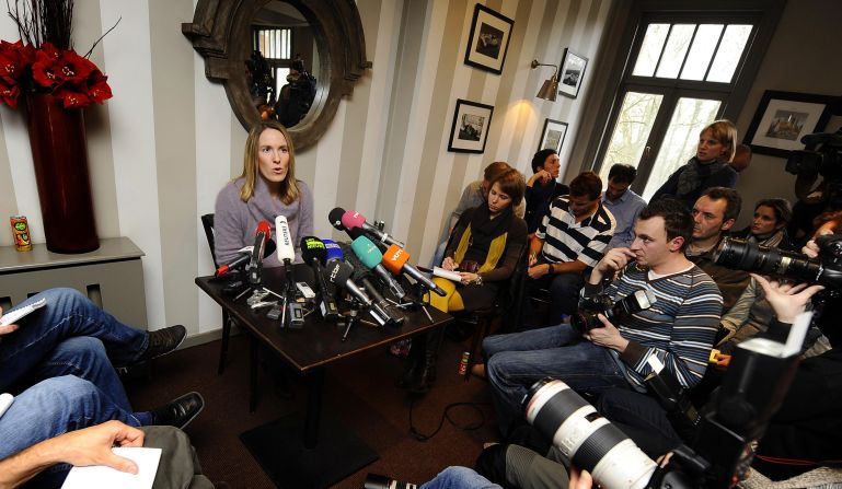 Justine Henin faces the media after announcing her retirement from professional tennis for a second time.