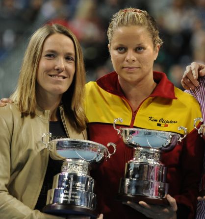 Justine Henin and her great rival Kim Clijsters at an event to celebrate the 10th anniversary of Belgium's Fed Cup triumph in 2001.