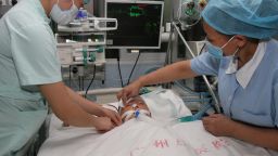 In a picture taken on October 16, 2011, two-year-old girl nicknamed Yue Yue is treated at a hospital in Guangzhou.