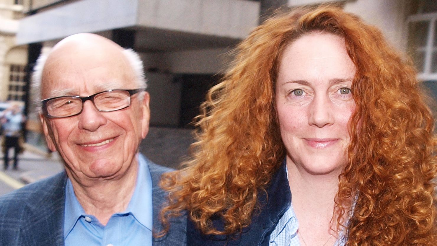 Rupert Murdoch and former NOTW editor Rebekah Brooks leave his London residence in July. 