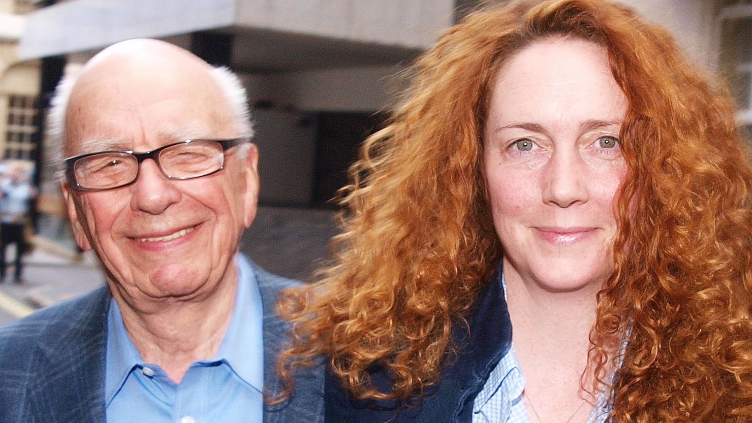 Rebekah Brooks, seen here with Rupert Murdoch, has been arrested but not charged over the police bribery probe.
