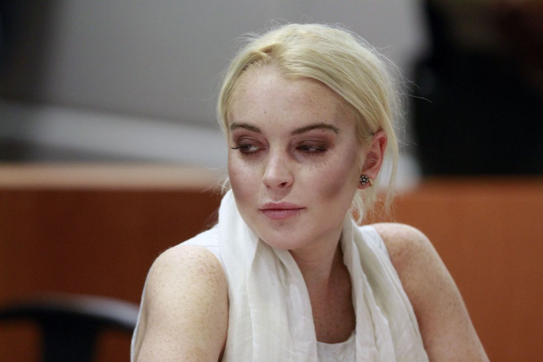 Lindsay Lohan must reappear Friday to do her community service after arriving too late to serve on Thursday.
