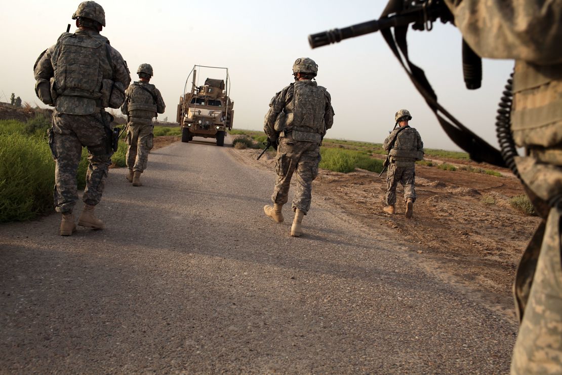 U.S. soldiers with the 3rd Armored Cavalry Regiment patrol Iskandariya, Iraq, on July 17, 2011.