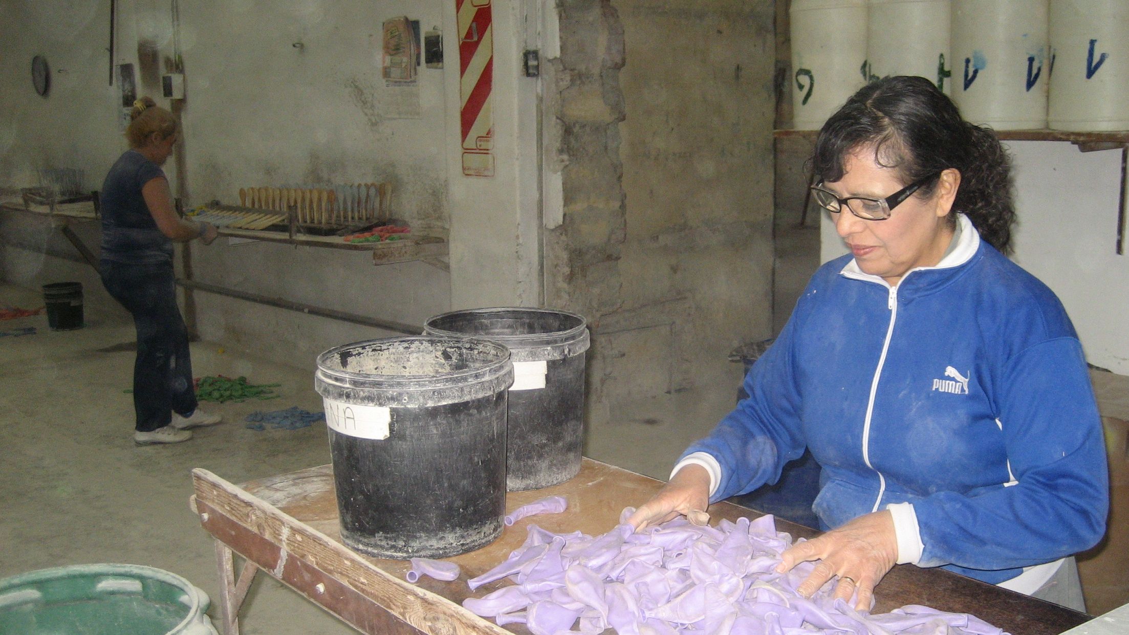 Carmen Perez, a balloon factory supervisor in Buenos Aires, says: "Before, we couldn't buy anything. And now we can. "
