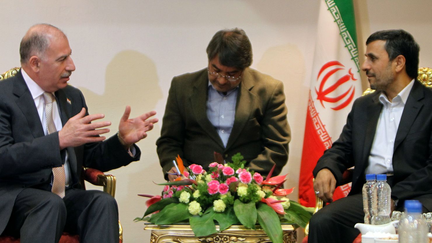 Iraqi Parliament Speaker Osama al-Nujaifi, left, meets with Iranian President Mahmoud Ahmadinejad, right, October 2.