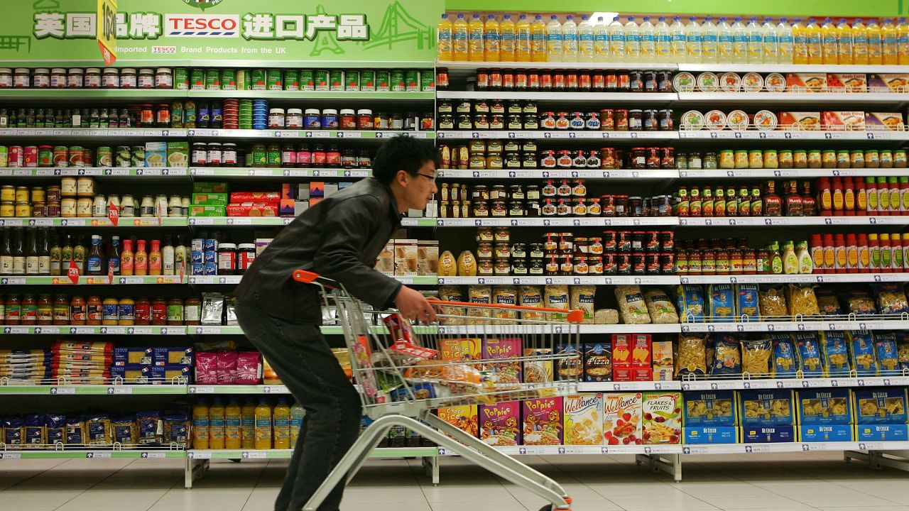 A Beijing resident shops at a Tesco supermarket, a UK-based chain that entered the Chinese market in 2004.