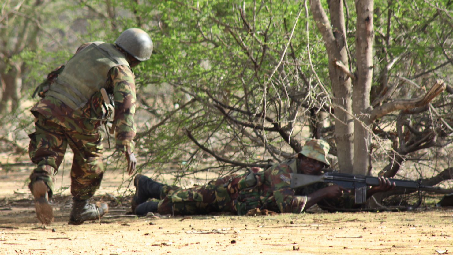 Kenyan soldiers pursue Islamic militants near Liboi, Somalia, on October 18.