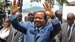 Cameroon's freshly-elected President Paul Biya waves to supporters on the campaign trail earlier this month.