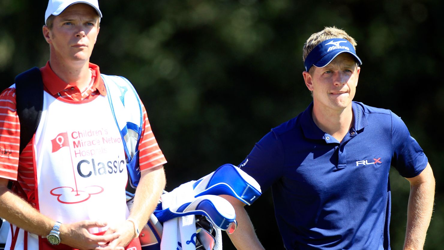 A pensive Luke Donald mulls over his options on his way to a second round 71 in Florida