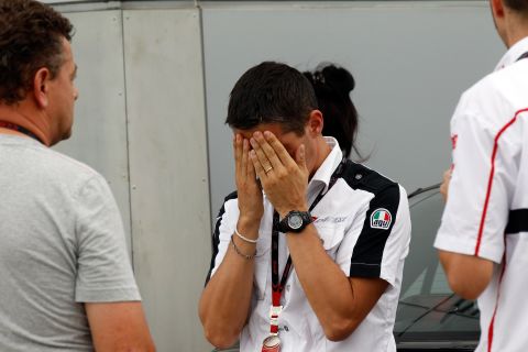 Crew members of Simoncelli's Honda team are left distraught by the tragic events.
