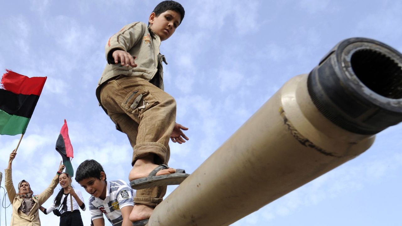 Children play on a tank that belonged to the Gadhafi regime in Misrata, Libya, on Sunday.