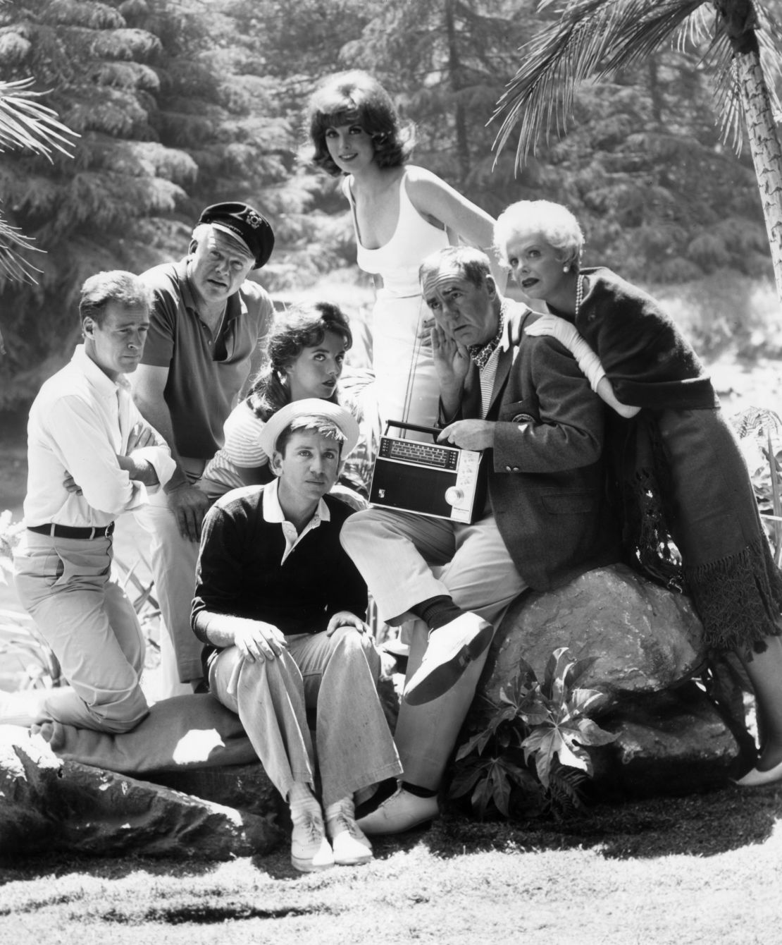 The cast of the TV comedy series "Gilligan's Island," which ran from 1964-1967, listens to a shortwave radio in a promotional photo.