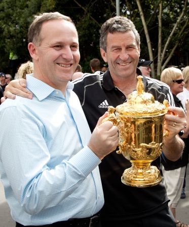 New Zealand prime minister John Key gets to grips with the World Cup with assistant coach Wayne Smith