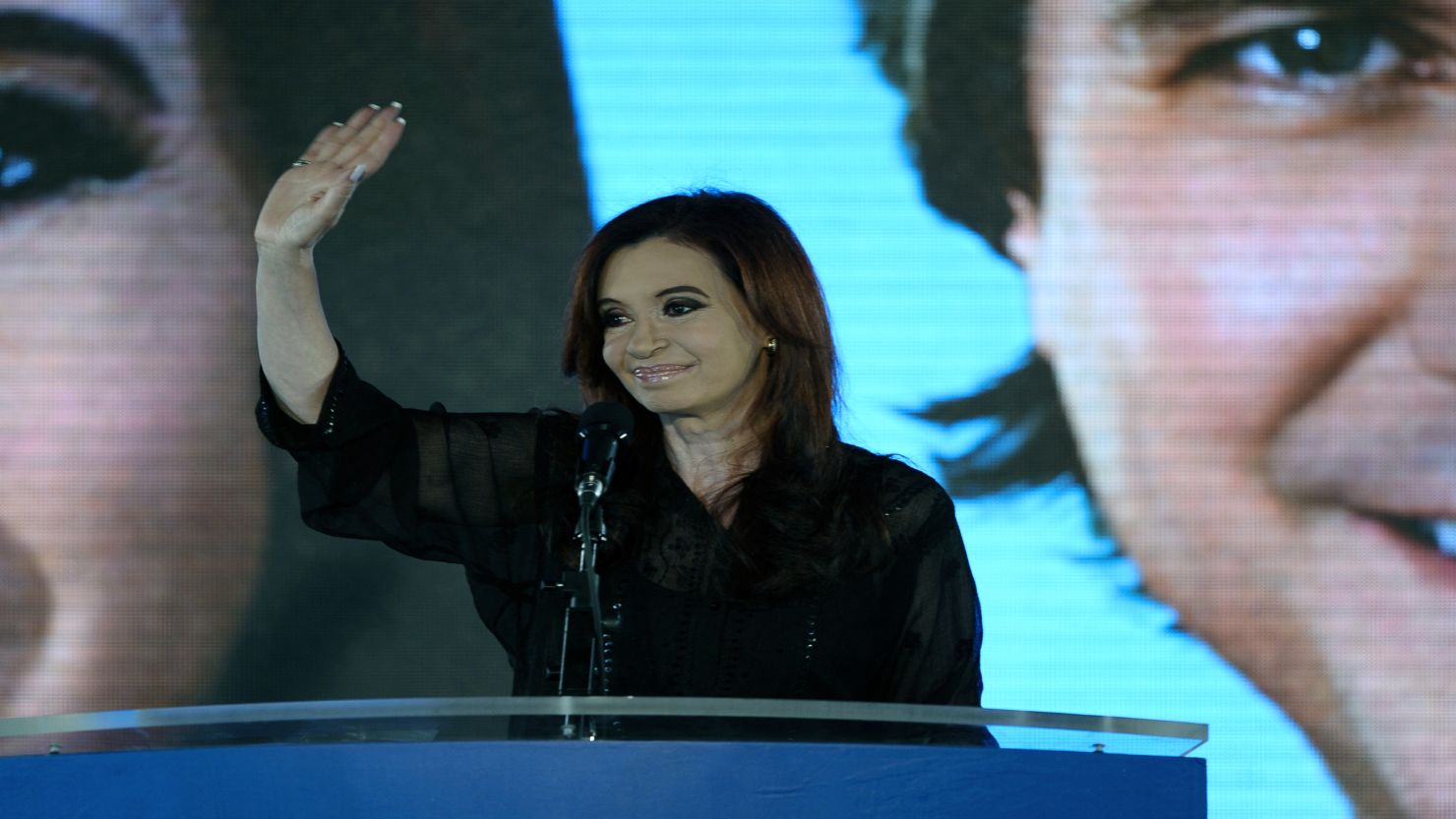 Argentina's President Cristina Fernandez de Kirchner waves in Buenos Aires after winning the general elections on Sunday. 