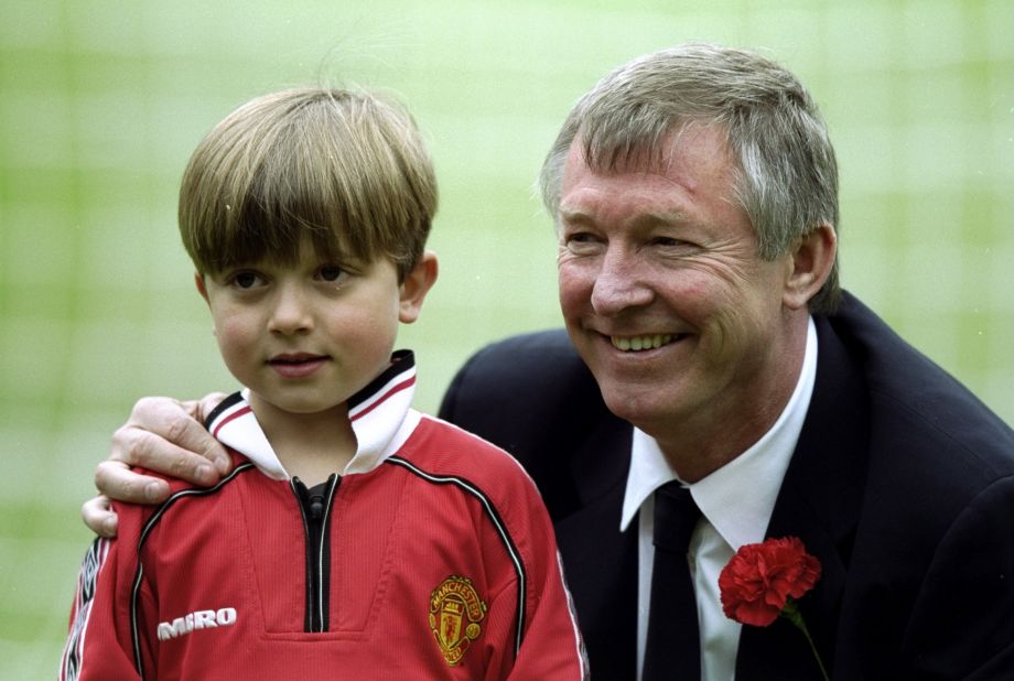 Ferguson with his grandson Jake before the 1999 FA Cup final victory against Newcastle that sealed United's third double in six years.