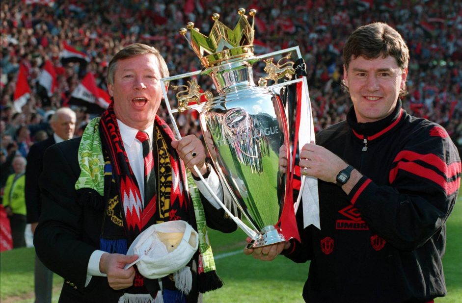 Ferguson celebrates with his assistant Brian Kidd after United won the Premiership again in 1994, then went on to secure a domestic double by beating Chelsea in the FA Cup final. United repeated the feat in 1996.  