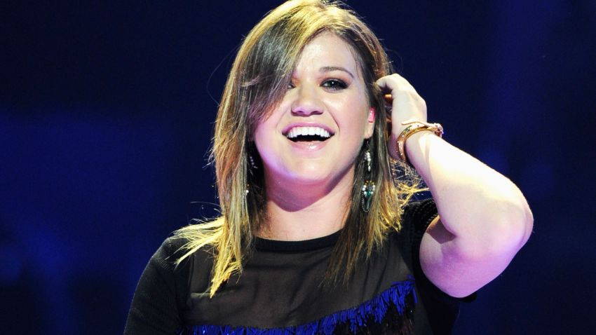 Kelly Clarkson performs at the iHeartRadio Festival in Las Vegas on September 23, 2011