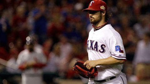 Texas Rangers pitcher C.J. Wilson wore a necklace by Phiten that some believe give athletes an edge.