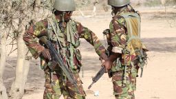 Kenyan soldiers prepare to advance near Liboi in Somalia, on October 18, 2011, near Kenya's border town with Somalia