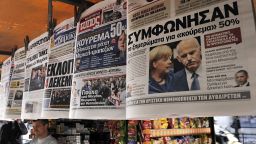 Newspapers are displayed at a kiosk in Athens on October 27, 2011. Greece reacted with measured relief on Thursday after European leaders sealed a deal to contain the eurozone debt crisis that slashes the country's huge debt by nearly a third.