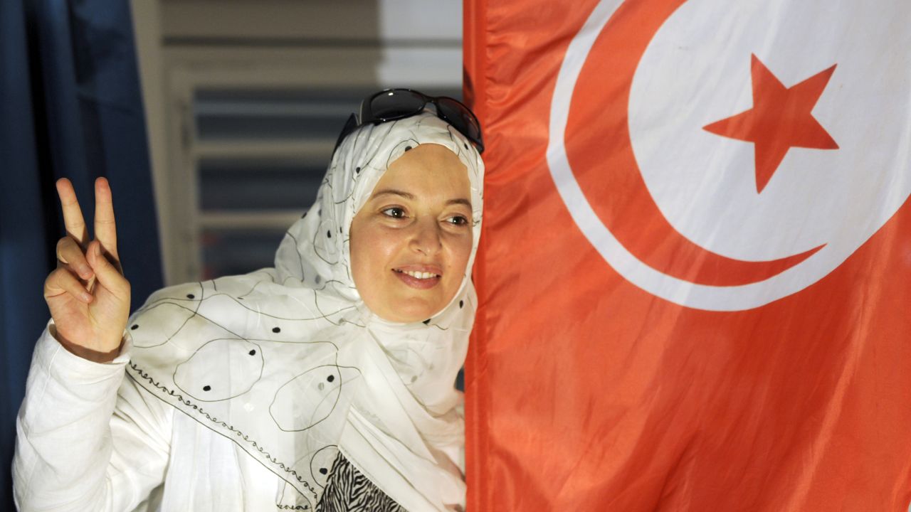 A supporter of Tunisia's Islamist Ennahda party celebrates on October 25 at party headquarters in Tunis.