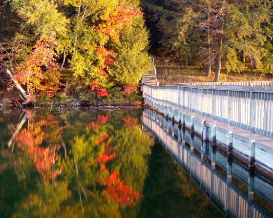 Alanna St. Laurent shared this serene photo taken on Pete's Lake in Munising, Michigan. "One of several inland lakes found in the Munising area, I captured this moment at sunrise with the fall color and white dock," she said.