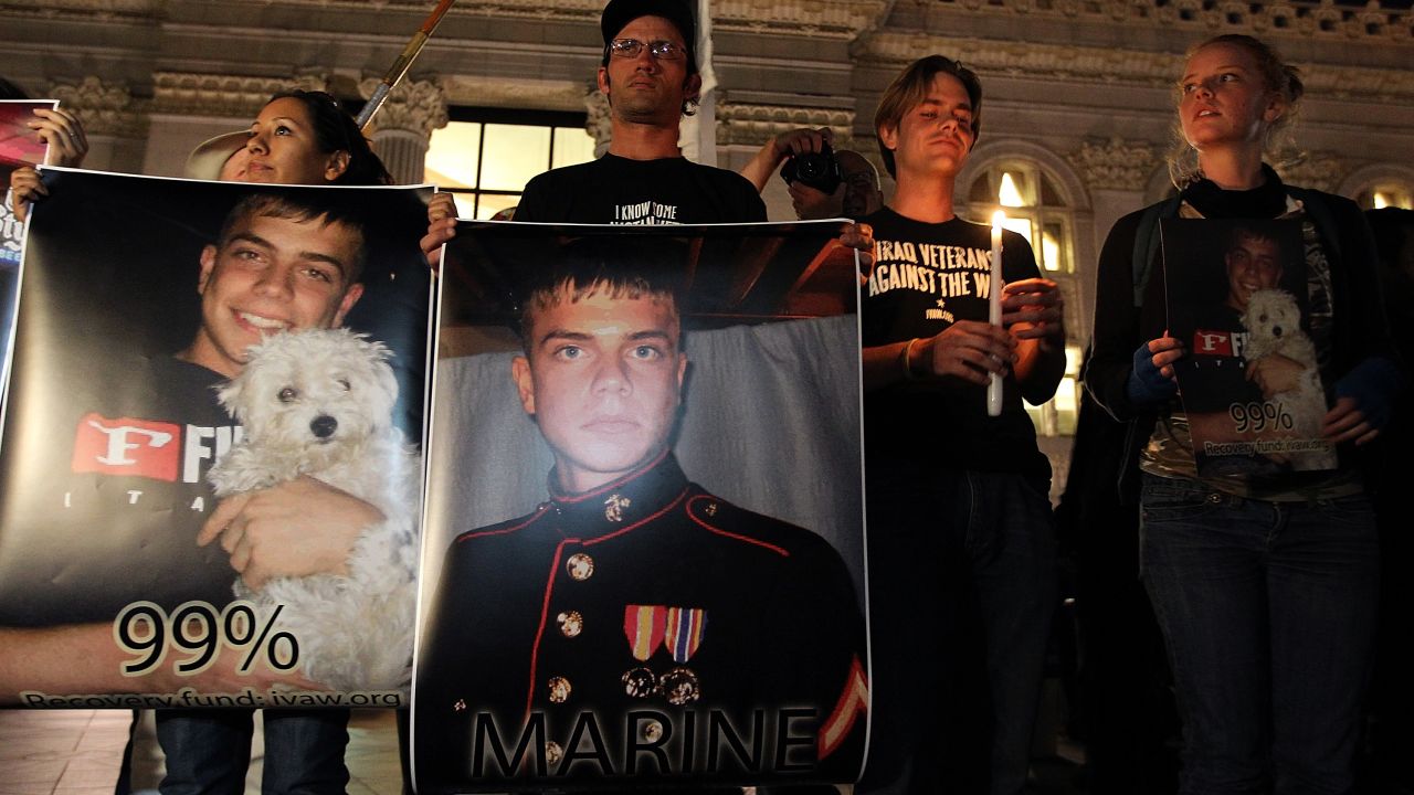 A vigil is held for Marine Lance Cpl. Scott Olsen, who was injured during an Occupy movement protest in California.