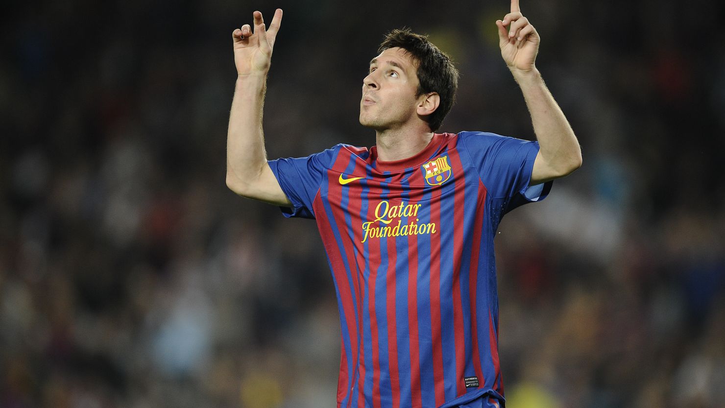 Lionel Messi celebrates scoring the opening goal in Barcelona's 5-0 defeat of Mallorca