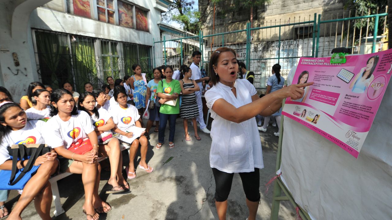  A Philippine health worker discusses family planning  with a class of pregnant women in suburban Manila this year.